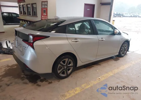 2021 Toyota Prius Xle z USA, uszkodzony, nr VIN JTDKAMFU4M3147210